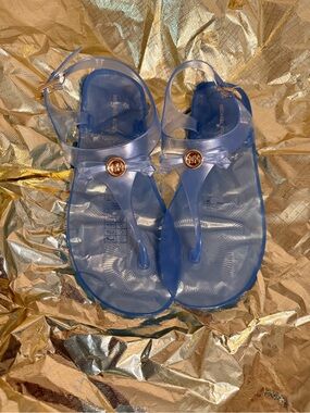 Michael Kors Translucent Blue Jelly Thong Sandals with Gold MK Medallion